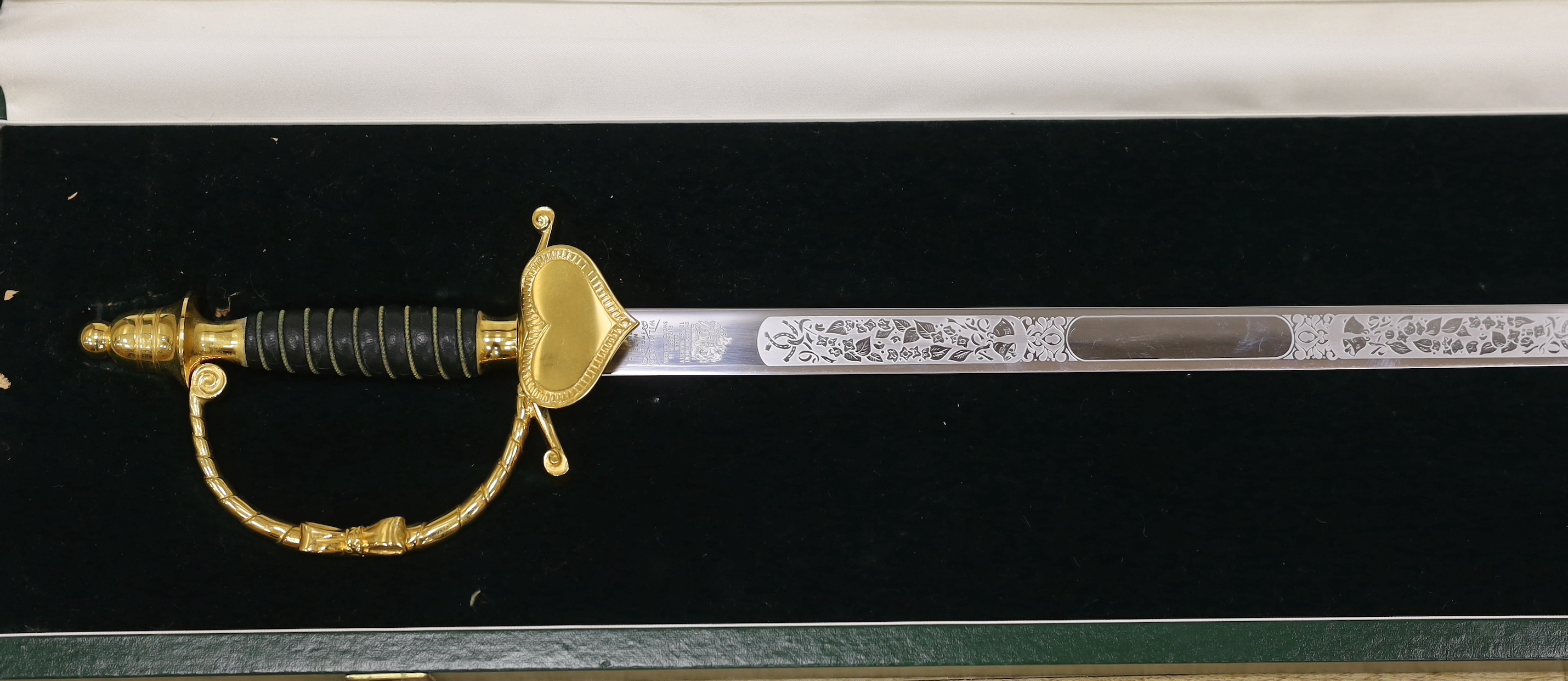 A Wilkinson presentation sword with etched blade, in Harrods case, blade 60cm